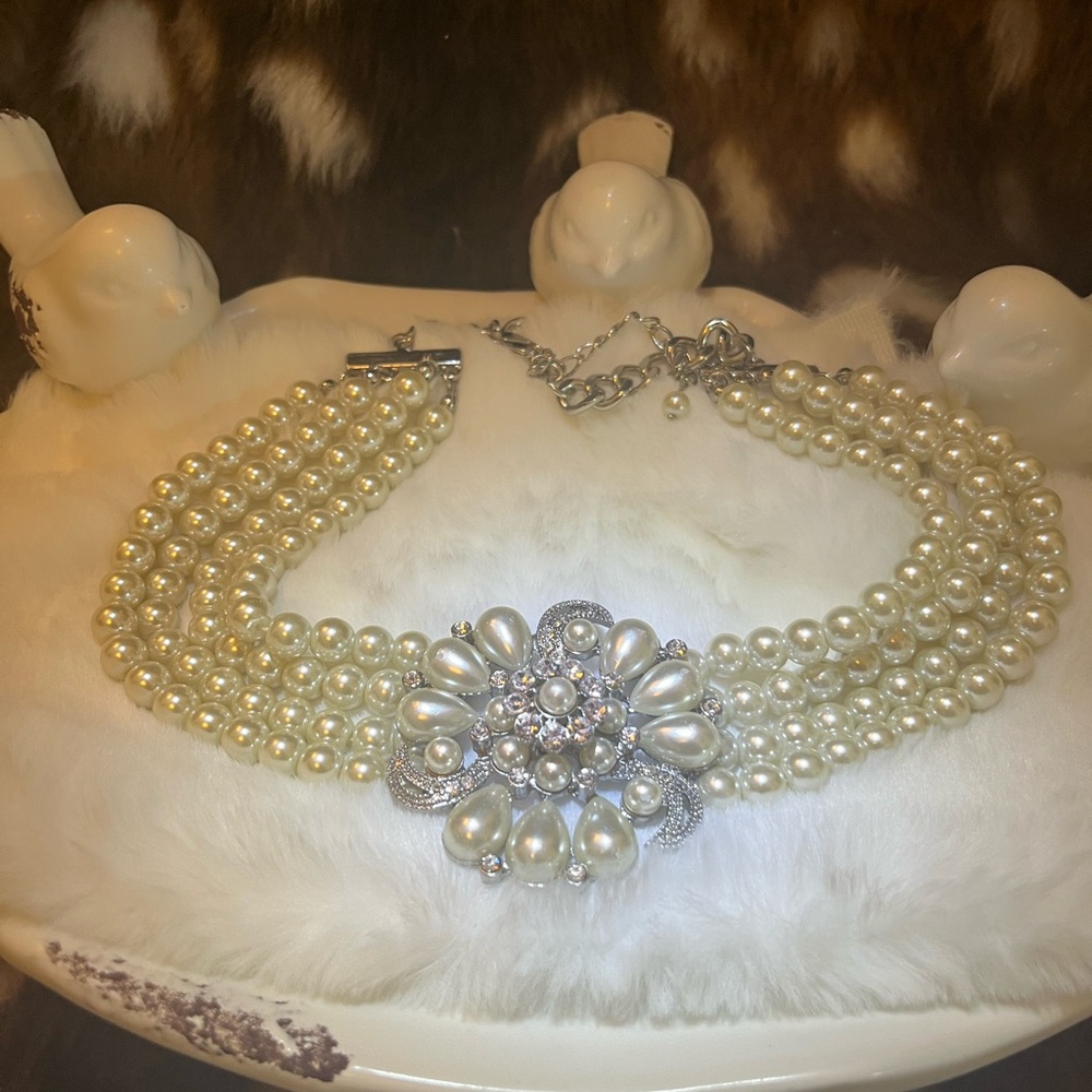 Charming Charlie, four strand flux pearls with a flower design choker